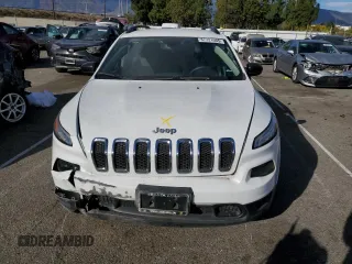 2016 Jeep Cherokee Sport z VIN 1C4PJLAB5GW184503, wystawiony jako Copart lot #87721055 z przebiegiem 107 629 mil mil oraz Szkoda całkowita • Salvage title. Historia ofert i sprzedaży dostępna na DreamBid. Obrazek 5.