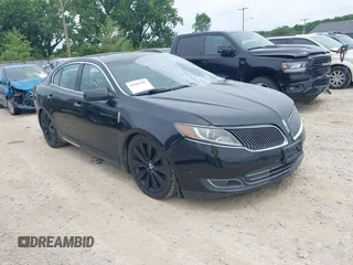 2013 Lincoln MKS EcoBoost with VIN 1LNHL9FT3DG607213, listed as a IAAI auction lot 42686285 with 97,622 mi miles and . Bid and sale history available at DreamBid. Image 1.
