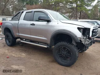 2012 Toyota Tundra 2WD Truck with VIN 5TFRM5F14CX038187, listed as a IAAI auction lot 41521633 with 187,039 mi miles. Bid and sale history available at carsss.com. Image 1.