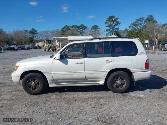 2002 Lexus LX 470 with VIN JTJHT00W123522570, listed as a IAAI auction lot 41739017 with 266,396 mi miles. Bid and sale history available at carsss.com. Image 14.
