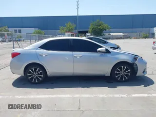 2019 Toyota Corolla L with VIN 5YFBURHE5KP877691, listed as a IAAI auction lot 42108591 with 85,813 mi miles and . Bid and sale history available at DreamBid. Image 13.