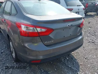 2013 Ford Focus SE z VIN 1FADP3F20DL235001, wystawiony jako IAAI lot #42343368 z przebiegiem 202 356 mil mil oraz . Historia ofert i sprzedaży dostępna na DreamBid. Obrazek 6.