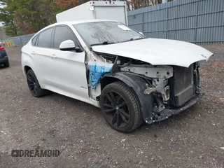 2018 BMW X6 sDrive35i with VIN 5UXKU0C56J0G81224, listed as a IAAI auction lot 41734077 with 121,145 mi miles. Bid and sale history available at carsss.com. Image 1.