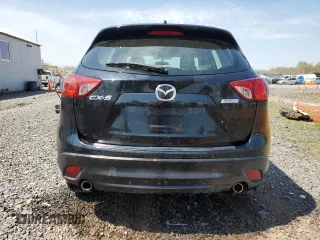 2014 Mazda CX-5 Sport with VIN JM3KE2BE8E0392545, listed as a Copart auction lot 54131455 with 63,917 mi miles and Salvage Title. Bid and sale history available at carsss.com. Image 6.