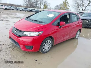 2015 Honda Fit LX z VIN 3HGGK5H54FM728448, wystawiony jako IAAI lot #41538650 z przebiegiem 115 450 mil mil oraz . Historia ofert i sprzedaży dostępna na DreamBid. Obrazek 17.
