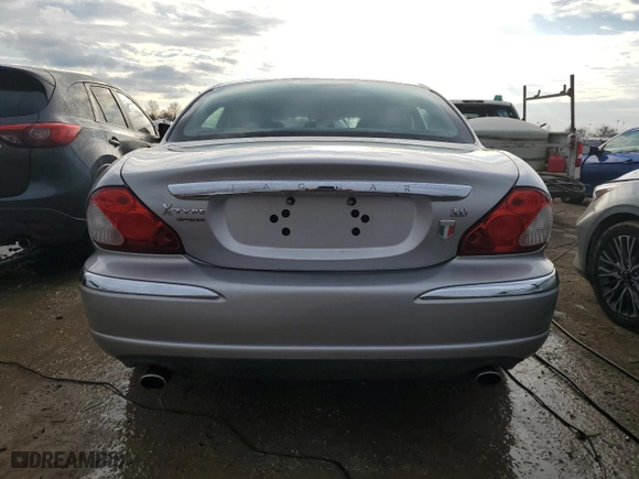 2005 Jaguar X-Type 3.0L with VIN SAJWA51A35WE55834, listed as a Copart auction lot 42930694 with NaN miles and Salvage Title. Bid and sale history available at carsss.com. Image 6.