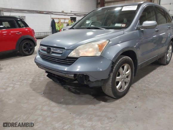 2007 Honda CR-V EX-L with VIN JHLRE48747C093649, listed as a IAAI auction lot 42086953 with 116,996 mi miles. Bid and sale history available at carsss.com. Image 13.