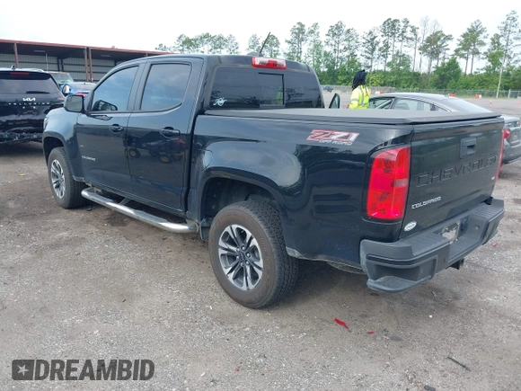 2021 Chevrolet Colorado 4WD Z71 with VIN 1GCGTDEN5M1190797, listed as a IAAI auction lot 42473079 with 77,290 mi miles and . Bid and sale history available at DreamBid. Image 3.