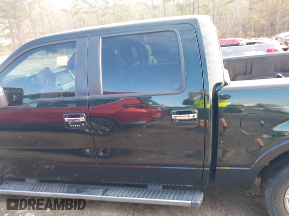 2012 Ford F-150 XL with VIN 1FTFW1CF2CFC15735, listed as a IAAI auction lot 41405687 with 205,457 mi miles. Bid and sale history available at carsss.com. Image 13.
