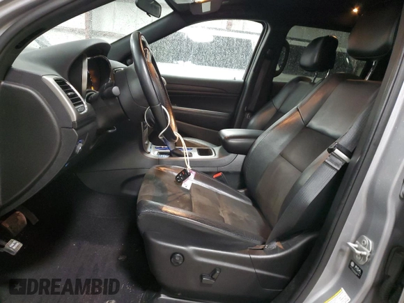 2021 Jeep Grand Cherokee Laredo E with VIN 1C4RJFAG3MC775884, listed as a Copart auction lot 52502325 with 59,368 mi miles and Salvage title. Bid and sale history available at DreamBid. Image 7.
