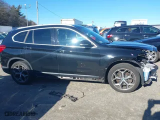 2019 BMW X1 xDrive28i with VIN WBXHT3C50K5L35416, listed as a IAAI auction lot 41195144 with 75,643 mi miles. Bid and sale history available at carsss.com. Image 14.