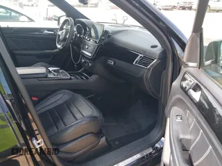 2016 Mercedes-Benz GLE 63 S AMG with VIN 4JGDA7FBXGA665133, listed as a IAAI auction lot 41634945 with 105,800 mi miles and . Bid and sale history available at DreamBid. Image 5.
