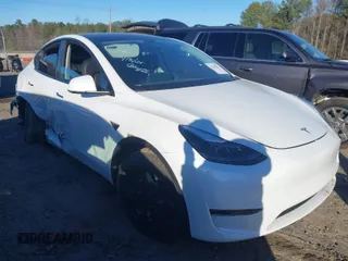 2023 Tesla Model Y Long Range with VIN 7SAYGAEE3PF753657, listed as a IAAI auction lot 41668917 with 33,301 mi miles and . Bid and sale history available at DreamBid. Image 1.