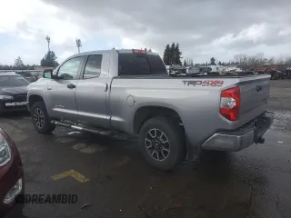 2017 Toyota Tundra SR z VIN 5TFUY5F18HX597005, wystawiony jako Copart lot #43058665 z przebiegiem 58 090 mil mil oraz Szkoda całkowita • Salvage title. Historia ofert i sprzedaży dostępna na DreamBid. Obrazek 2.