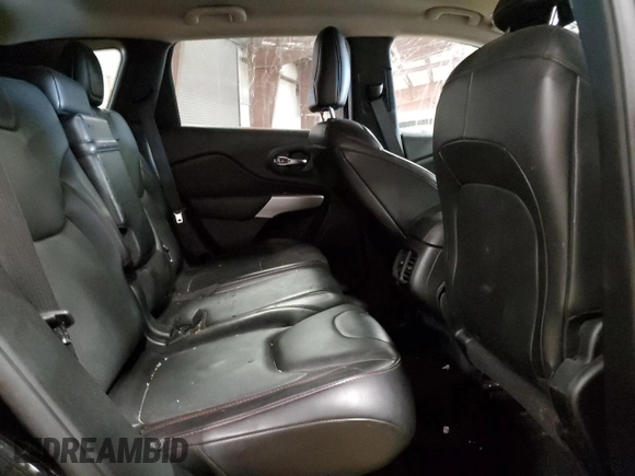 2018 Jeep Cherokee Trailhawk Leather Plus with VIN 1C4PJMBX4JD558201, listed as a Copart auction lot 53462775 with 94,604 mi miles and Salvage title. Bid and sale history available at DreamBid. Image 12.