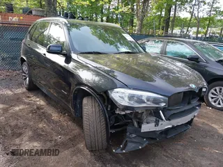 2014 BMW X5 xDrive35i z VIN 5UXKR0C54E0H18715, wystawiony jako IAAI lot #42094647 z przebiegiem 144 021 mil mil oraz . Historia ofert i sprzedaży dostępna na DreamBid. Obrazek 1.