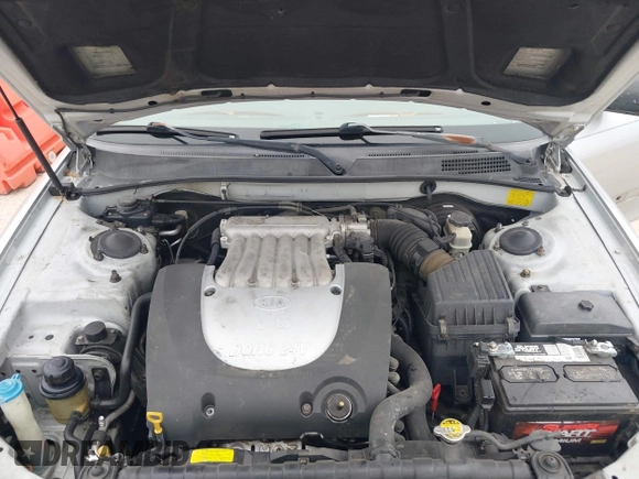 2003 Kia Optima LX z VIN KNAGD128235248556, wystawiony jako IAAI lot #42366002 z przebiegiem 140 904 mil mil oraz . Historia ofert i sprzedaży dostępna na DreamBid. Obrazek 10.