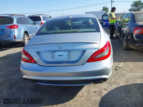 2014 Mercedes-Benz CLS 550 with VIN WDDLJ7DB0EA104042, listed as a IAAI auction lot 42643727 with 96,841 mi miles and . Bid and sale history available at DreamBid. Image 16.