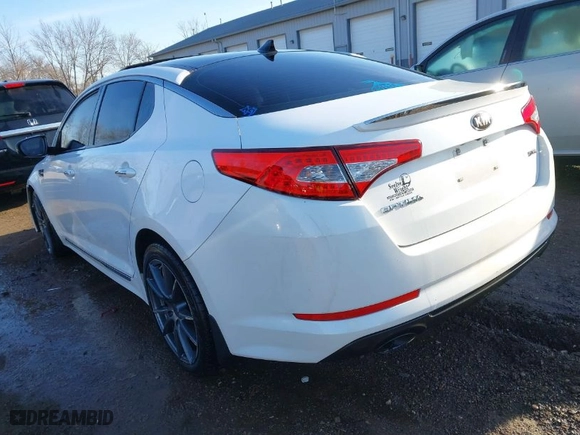 2013 Kia Optima SX w/Limited Pkg with VIN 5XXGR4A61DG112602, listed as a IAAI auction lot 41847204 with 197,828 mi miles. Bid and sale history available at carsss.com. Image 3.