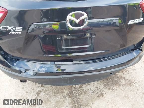 2013 Mazda CX-5 Grand Touring with VIN JM3KE4DE6D0148030, listed as a IAAI auction lot 42082947 with 119,432 mi miles and . Bid and sale history available at DreamBid. Image 6.