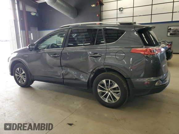 2016 Toyota RAV4 Hybrid XLE with VIN JTMRJREV0GD035203, listed as a Copart auction lot 54300225 with 153,369 mi miles and Salvage Title. Bid and sale history available at carsss.com. Image 2.