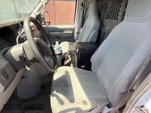 2013 Ford Econoline Cargo Commercial with VIN 1FTNE1EWXDDA61929, listed as a IAAI auction lot 42186573 with 173,741 mi miles and . Bid and sale history available at DreamBid. Image 1.