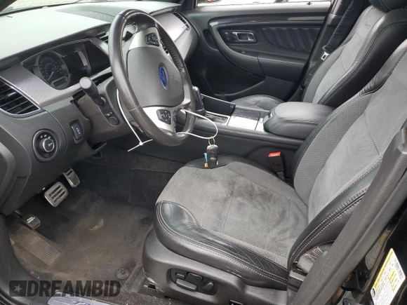 2015 Ford Taurus SHO with VIN 1FAHP2KT2FG188060, listed as a Copart auction lot 48952155 with 93,092 mi miles and Salvage Title. Bid and sale history available at DreamBid. Image 7.