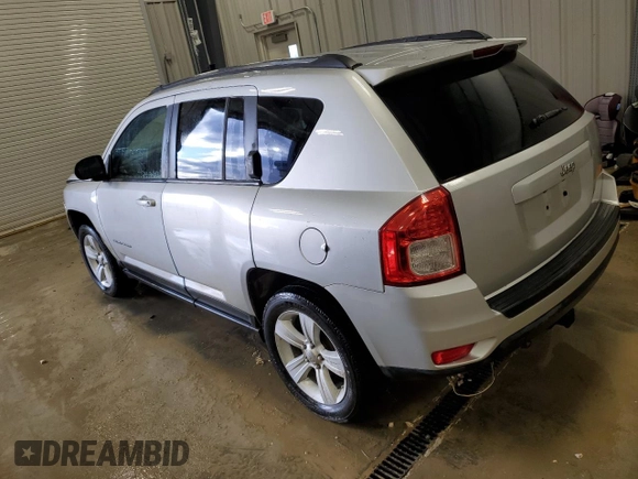2011 Jeep Compass with VIN 1J4NT1FB0BD245673, listed as a Copart auction lot 82597074 with 207,695 mi miles and Clean Title. Bid and sale history available at carsss.com. Image 2.