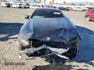 2023 BMW 8 Series M850i with VIN WBAGV8C06PCL57473, listed as a Copart auction lot 39398193 with 0 mi miles. Bid and sale history available at carsss.com. Image 5.