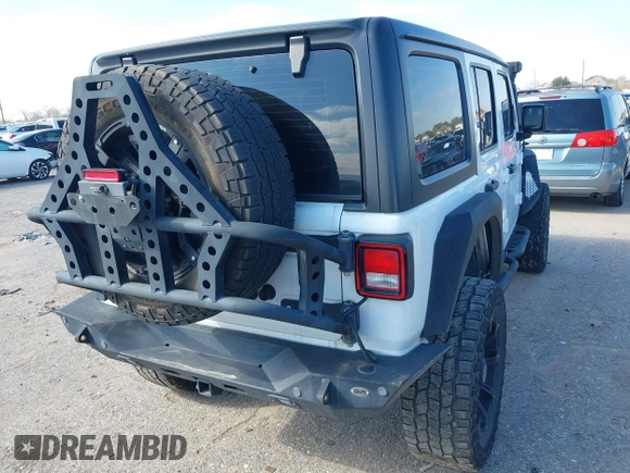 2018 Jeep Wrangler Unlimited Sport S с VIN 1C4HJXDG0JW205803, выставлен на аукционе IAAI как лот 41615097 с пробегом Не указан миль и . История ставок и продаж доступна на DreamBid. Изображение 4.