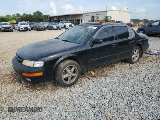 1999 Nissan Maxima GXE z VIN JN1CA21D8XT807286, wystawiony jako Copart lot #57518235 z przebiegiem Nie podano mil oraz Czysty tytuł • Clean title. Historia ofert i sprzedaży dostępna na DreamBid. Obrazek 1.
