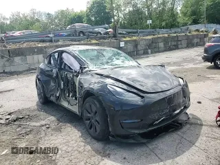 2024 Tesla Model Y Long Range with VIN 7SAYGDEE7RA327259, listed as a Copart auction lot 57494435 with Not provided miles and Salvage title. Bid and sale history available at DreamBid. Image 13.