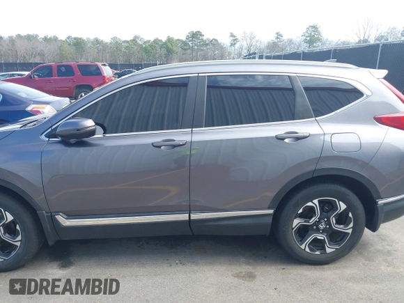 2018 Honda CR-V Touring with VIN 7FARW1H9XJE018575, listed as a IAAI auction lot 41747192 with 83,699 mi miles and . Bid and sale history available at carsss.com. Image 14.