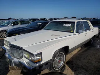 1990 Cadillac Brougham z VIN 1G6DW54Y6LR711203, wystawiony jako Copart lot #76484634 z przebiegiem 121 310 mil mil oraz Nie do naprawy. Historia ofert i sprzedaży dostępna na DreamBid. Obrazek 1.