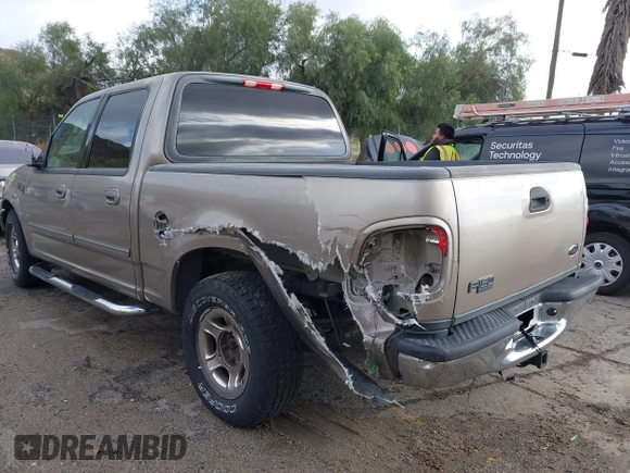 2003 Ford F-150 XLT with VIN 1FTRW07623KD34295, listed as a IAAI auction lot 41515387 with 163,506 mi miles. Bid and sale history available at carsss.com. Image 3.
