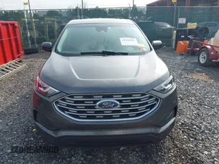 2020 Ford Edge SE z VIN 2FMPK3G97LBA25233, wystawiony jako IAAI lot #42240381 z przebiegiem 53 868 mil mil oraz . Historia ofert i sprzedaży dostępna na DreamBid. Obrazek 13.