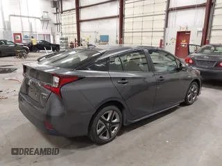 2020 Toyota Prius L Eco with VIN JTDKARFU1L3117299, listed as a IAAI auction lot 42544586 with 42,560 mi miles and . Bid and sale history available at DreamBid. Image 4.