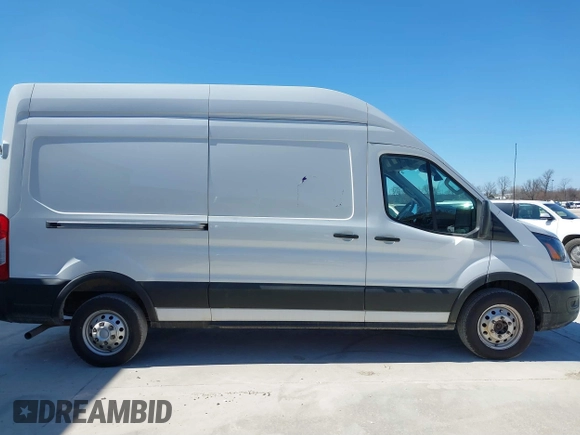 2023 Ford Transit Cargo with VIN 1FTBR2X86PKA51393, listed as a IAAI auction lot 41769269 with 91,032 mi miles and . Bid and sale history available at DreamBid. Image 13.