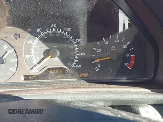 1999 Mercedes-Benz CLK 320/430 z VIN WDBLJ65G1XF101749, wystawiony jako IAAI lot #41689126 z przebiegiem 172 429 mil mil oraz . Historia ofert i sprzedaży dostępna na DreamBid. Obrazek 7.