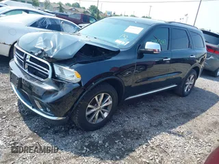 2014 Dodge Durango Limited with VIN 1C4RDJDG5EC532942, listed as a IAAI auction lot 42465047 with 116,617 mi miles and . Bid and sale history available at DreamBid. Image 2.