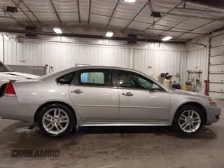 2014 Chevrolet Impala LTZ with VIN 2G1WC5E3XE1157931, listed as a IAAI auction lot 42688907 with 119,985 mi miles and . Bid and sale history available at DreamBid. Image 13.