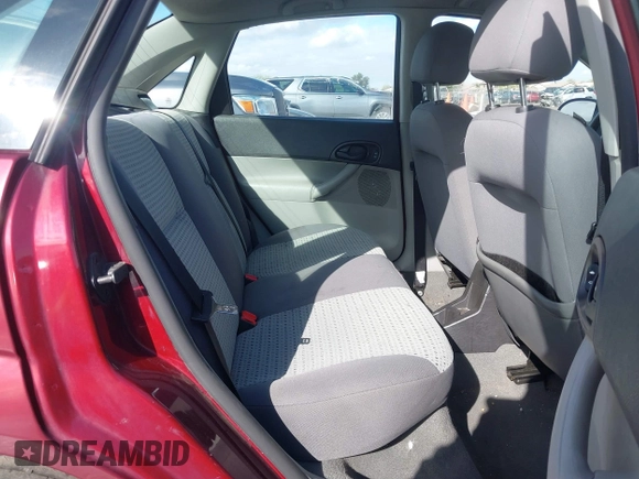 2007 Ford Focus S z VIN 1FAHP34NX7W114297, wystawiony jako IAAI lot #41774573 z przebiegiem 111 079 mil mil oraz . Historia ofert i sprzedaży dostępna na DreamBid. Obrazek 8.