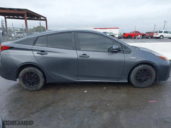 2019 Toyota Prius L Eco with VIN JTDKARFU3K3099256, listed as a IAAI auction lot 41813619 with 169,900 mi miles. Bid and sale history available at carsss.com. Image 13.