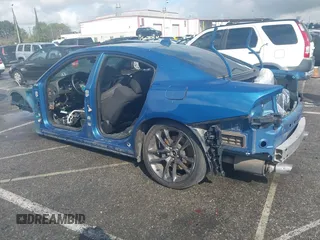 2021 Dodge Charger Scat Pack Widebody with VIN 2C3CDXGJ9MH562199, listed as a IAAI auction lot 41764056 with Not Provided miles and . Bid and sale history available at carsss.com. Image 3.