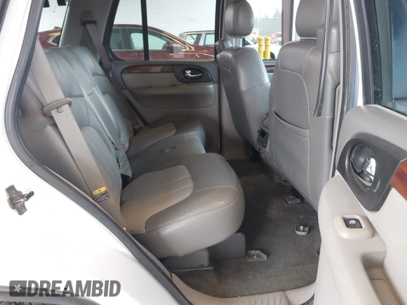 2003 GMC Envoy SLE with VIN 1GKDT13SX32319740, listed as a IAAI auction lot 41923578 with 210,811 mi miles. Bid and sale history available at carsss.com. Image 8.