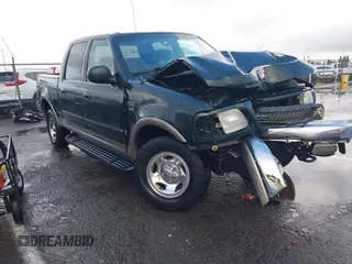 2001 Ford F-150 SuperCrew XLT with VIN 1FTRW08W41KA63428, listed as a IAAI auction lot 41565419 with 181,557 mi miles. Bid and sale history available at carsss.com. Image 1.