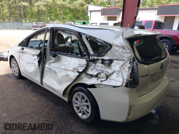 2014 Toyota Prius Two with VIN JTDZN3EU7EJ013979, listed as a IAAI auction lot 42105528 with 203,589 mi miles and . Bid and sale history available at DreamBid. Image 3.