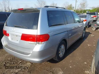 2010 Honda Odyssey EX-L with VIN 5FNRL3H68AB007631, listed as a IAAI auction lot 42064445 with 203,361 mi miles. Bid and sale history available at carsss.com. Image 4.