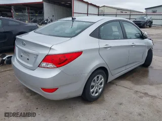 2014 Hyundai Accent GLS with VIN KMHCT4AE9EU608617, listed as a IAAI auction lot 41537589 with 77,678 mi miles. Bid and sale history available at carsss.com. Image 4.