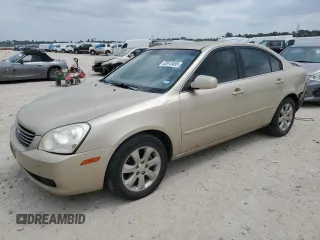 2008 Kia Optima LX z VIN KNAGE124285235064, wystawiony jako Copart lot #52913455 z przebiegiem 140 423 mil mil oraz Szkoda całkowita • Salvage title. Historia ofert i sprzedaży dostępna na DreamBid. Obrazek 1.